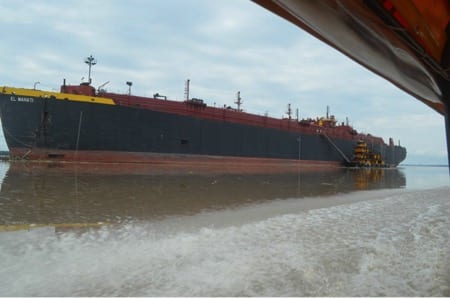 A tanker waits to pick up oil